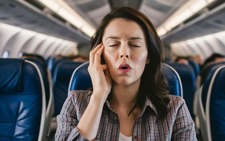 Why do ears hurt on an airplane and how to prevent it?